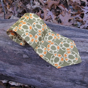 1970s mens wide tie, olive green and orange, abstract shapes