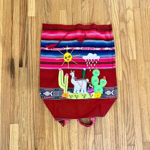 Vintage Mexican souvenir backpack with drawstring top, serape embroidered backpack