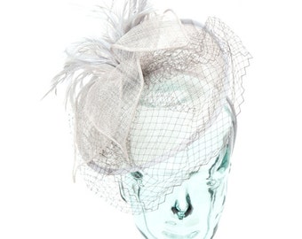 Gray Sinamay headband fascinator, accented with feathers, flower and veil