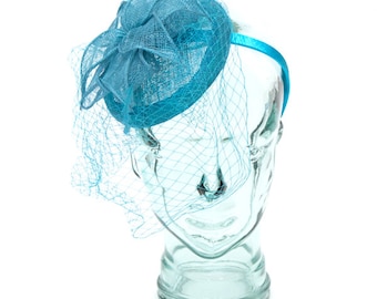 Aqua Sinamay headband fascinator, accented with veil, feathers and flower