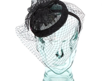 Black Sinamay headband fascinator, accented with veil, feathers and flower
