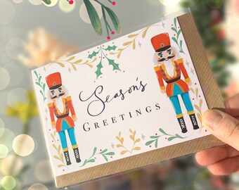 Seasons greetings, nutcracker Christmas illustration, A6 Christmas greeting cadd