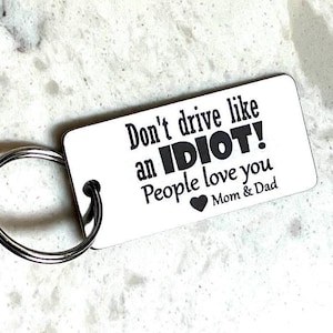 Don’t drive like an idiot! People love you - Engraved Stainless Steel Keychain / Funny Gift for Teen Driver