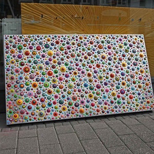 May include: A white rectangular canvas covered in hundreds of colorful circles, creating a vibrant and abstract pattern.