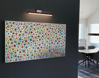 May include: A colorful abstract painting with a silver background featuring a pattern of various sized circles in shades of red, blue, green, yellow, and orange.