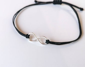 Black silver Infinity bracelet, symbolic mindful jewellery, small unisex bracelet