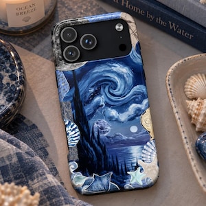May include: A smartphone case featuring a dark blue artistic print of a swirling night sky over a calm sea, accented with various seashells and a stingray illustration. The design includes a prominent dark tower and a bright moon in the center.
