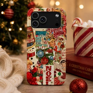 May include: A smartphone case featuring a vintage-style Christmas collage with illustrations of a snowman, a person in a red coat, ornaments, pine branches, and the text "Frosty," "Hot Cocoa," and "Noel" in red, green, and cream colors.
