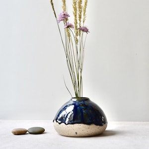 Handmade speckled clay vase with blue glaze, unique ceramic pottery case perfect for nautical home decor