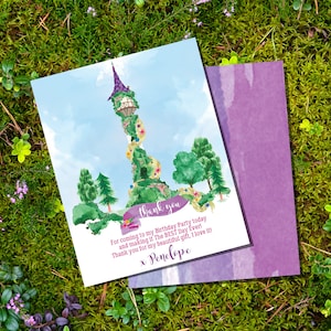 May include: A thank you card with a watercolor illustration of a tower with a winding path leading up to it. The text on the card reads "Thank you" and "For coming to my Birthday Party today and making it The BEST Day Ever! Thank you for my beautiful gift. I love it! x Penelope".