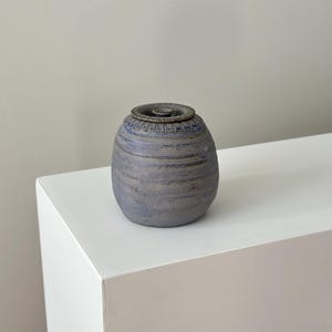 Vintage blue grey studio pottery jar with top, signed.