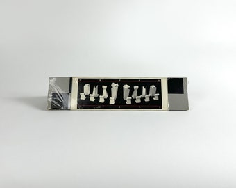 1988 – Paper Chess by Peter Hewitt for the Museum of Modern Art