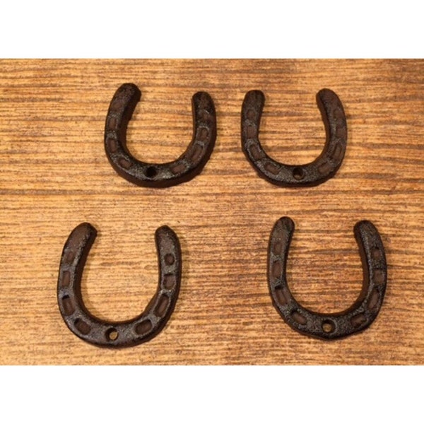 Four X-Small Cast Iron Horse Shoes 05211