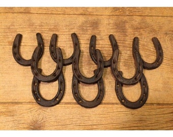 Twelve (12) Cast Iron Horseshoes Small 3" wide Twelve (12) 0170-05209