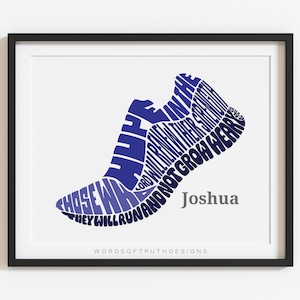 May include: A blue and purple word art print of a running shoe with the text "Hope in the Lord will renew their strength, they will run and not grow weary" and the name "Joshua" at the bottom. The print is framed in a black frame and has the text "Words of Truth Designs" at the bottom.