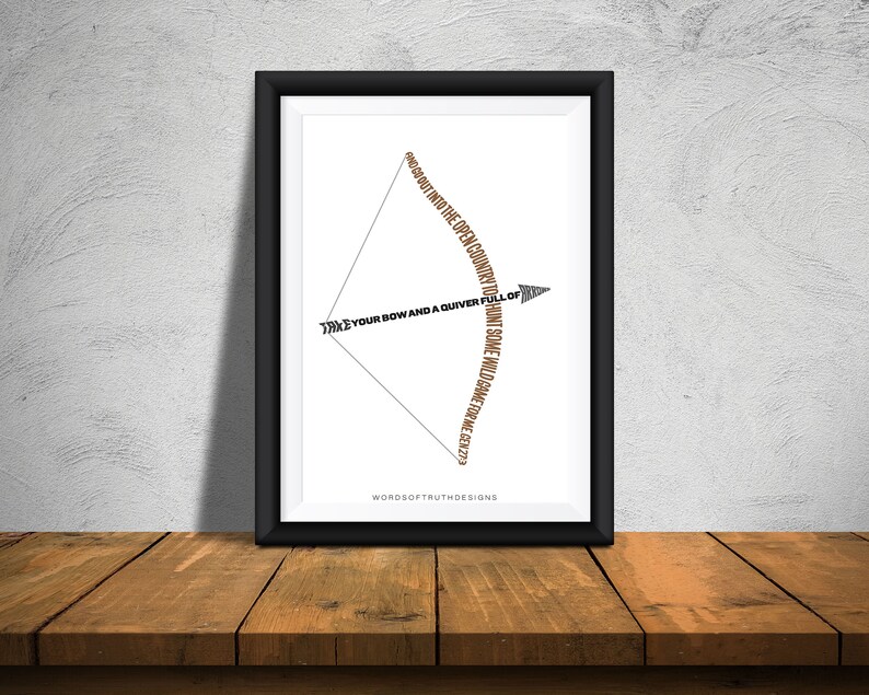 May include: A black framed print with a white background and a brown text design. The text is arranged in the shape of an arrow and reads "Take your bow and a quiver full of arrows and go out into the open country and hunt some wild game for me Gen 27:3." The text is in a serif font and is centered on the page. The print is titled "WordsofTruthDesigns".