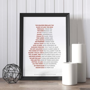 May include: A framed printable with a black frame and white background. The text is in red and includes bible verses about the glory of God, the work of his hands, and the purpose of his creation. The text includes the following verses: Psalm 19:1, Psalm 139:14, Psalm 138:8, Philippians 1:6, Isaiah 68:8, and Romans 8:28.
