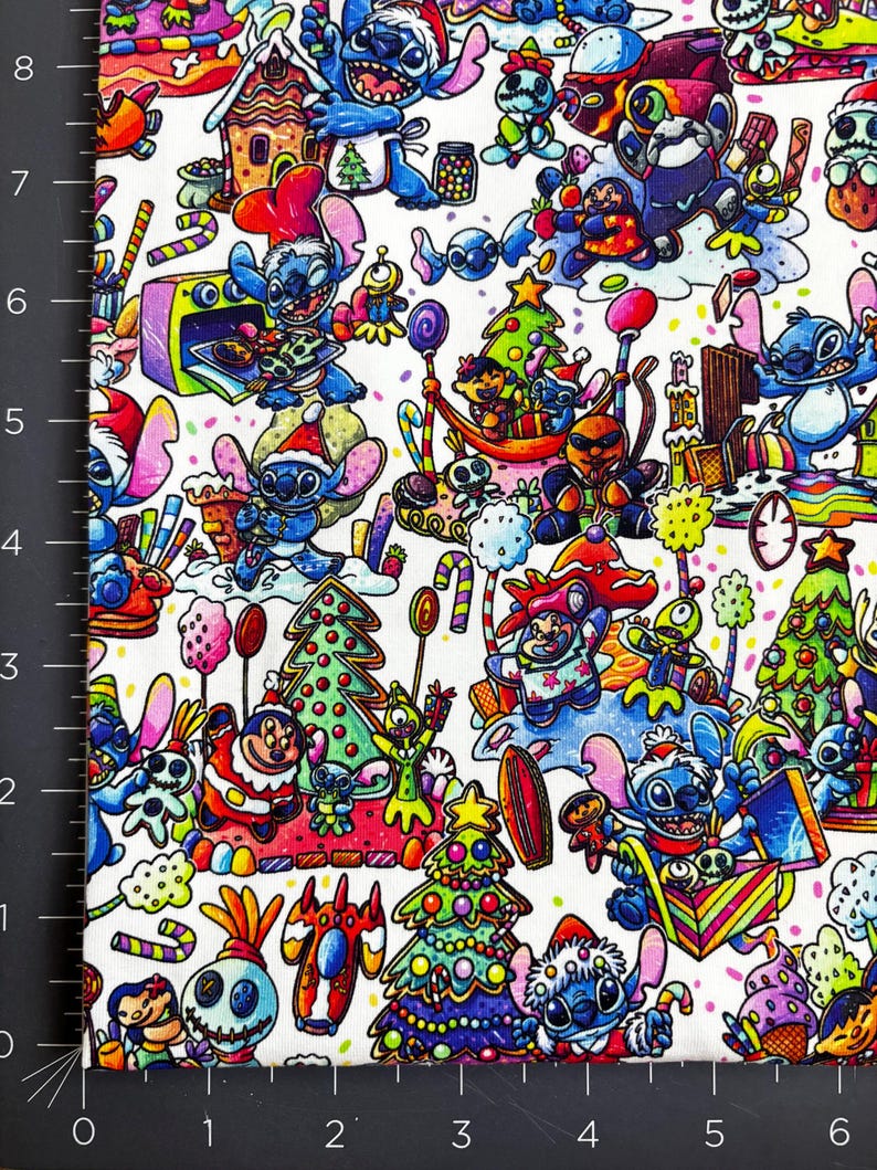 May include: White fabric with a colorful cartoon print featuring Stitch characters in Christmas-themed settings. The design includes Christmas trees, candy canes, and various Stitch illustrations in a festive holiday pattern.