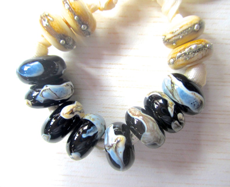 Shards on Black and Silvered Ivory Handmade Lampwork Bead Set