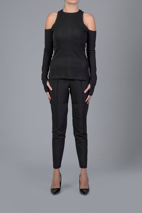 tight fit black trousers