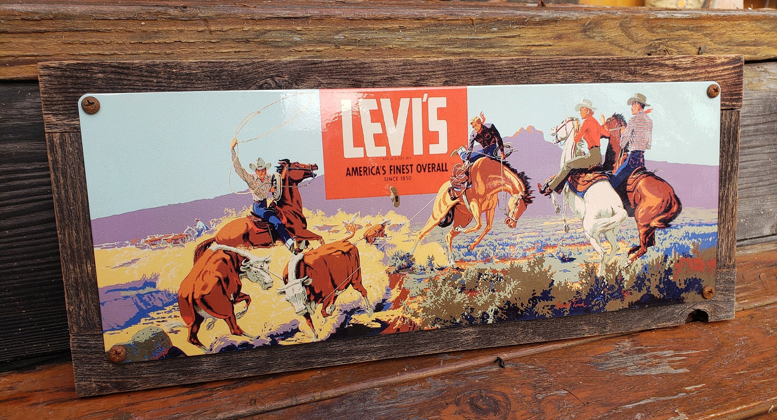 Vintage Levis Jeans Western Ad Reproduction Metal Sign Vintage Levis Jeans Western Ad Reproduction Metal Sign