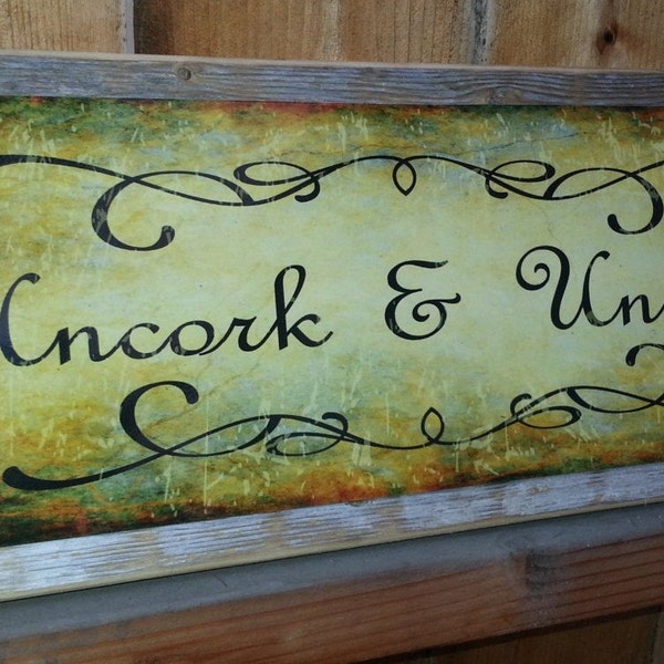 Uncork and Unwind Metal Sign On Reclaimed Barnwood Frame