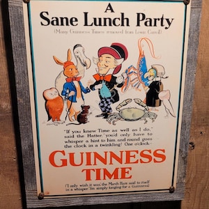 May include: A framed vintage-style sign with a whimsical illustration. The sign reads "A Sane Lunch Party" and "Guinness Time" with characters from Alice in Wonderland. The frame is made of weathered wood.