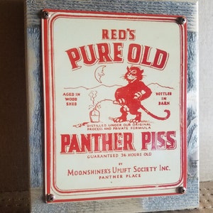 Reds Pure old Panther Piss Moonshine Label Metal Sign Wood Frame