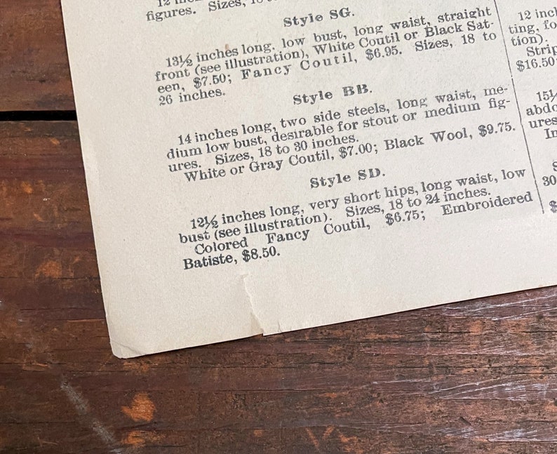 May include: A vintage price list for corsets, featuring different styles and sizes. The list includes details like bust measurements, waist measurements, and fabric options. The text mentions "White Coutil", "Black Sat-een", "Gray Coutil", "Black Wool", "Colored Fancy Coutil", and "Embroidered Batiste".