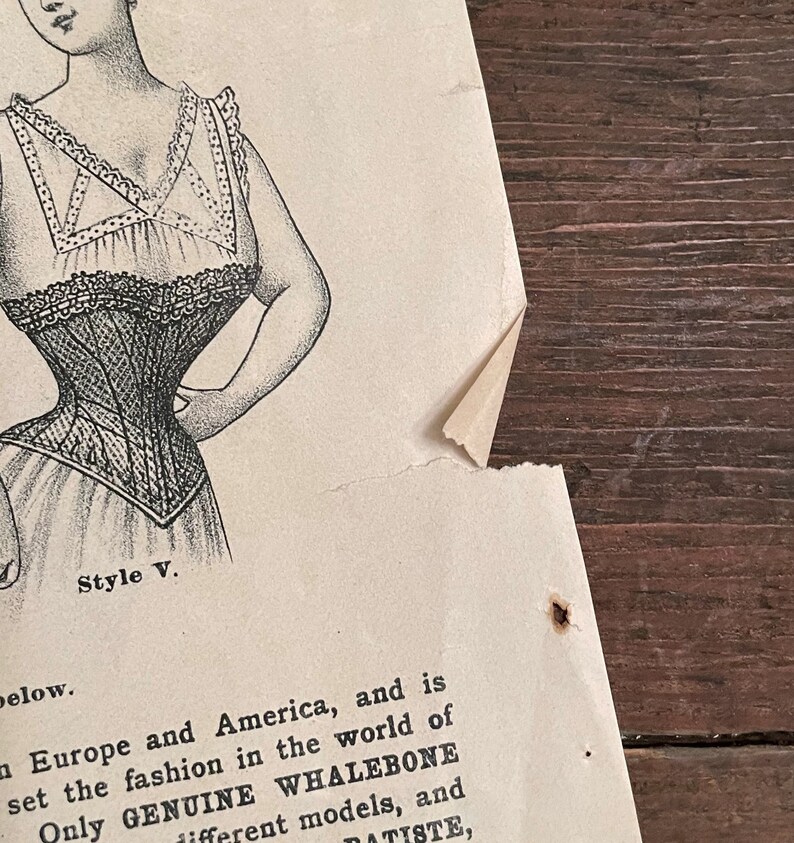 May include: A black and white illustration of a woman wearing a corset. The text "Style V." is below the image. The text "Only GENUINE WHALEBONE different models, and DATISTE" is below the text "Style V."
