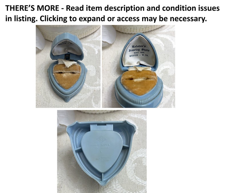 May include: A blue heart-shaped ring box with a velvet interior. The box is open and the lid has the text "Kalston's Jewelry Store" and "Weston, W.Va."
