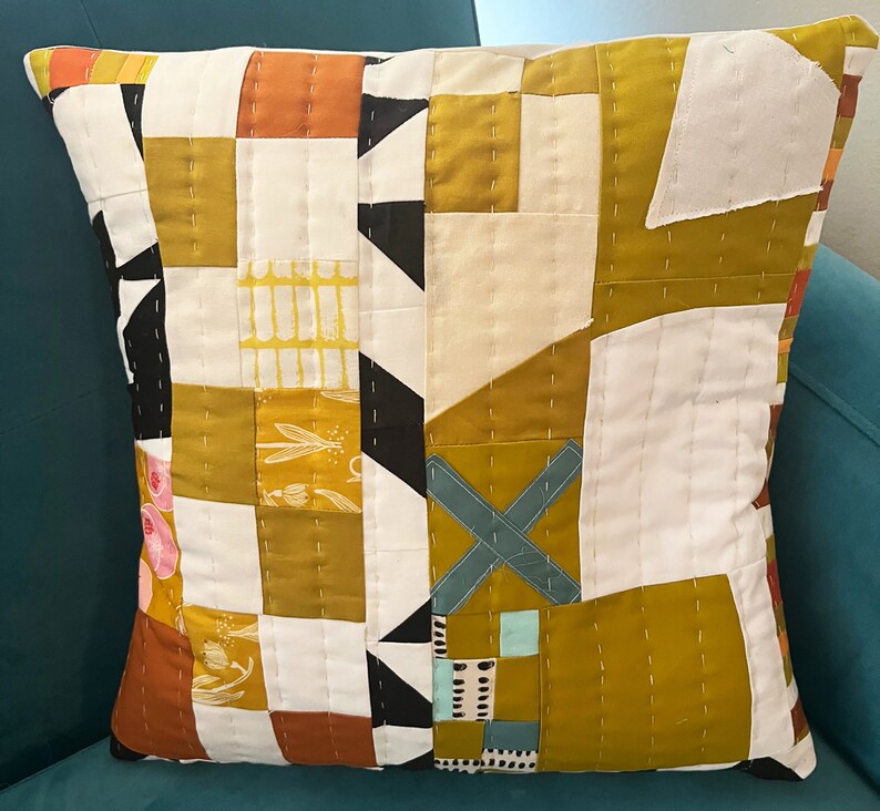 X Marks The Spot hand-quilted pillow. Abstract. Geometric. Gold and White with pops of color. Perfect for any decor. 16x 16 image 1