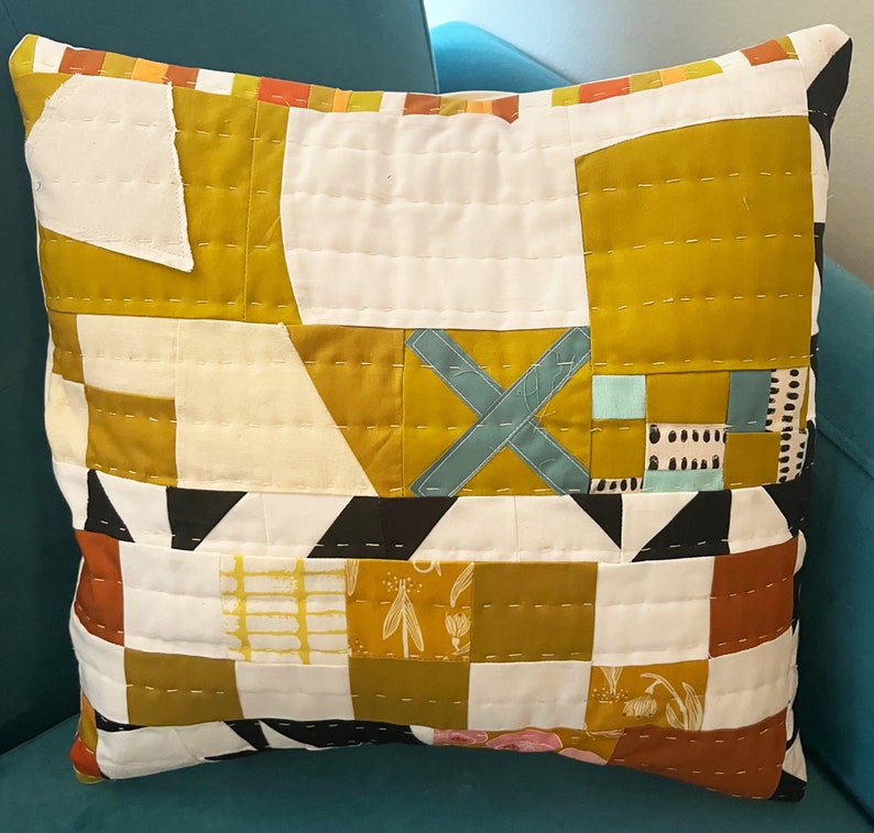 X Marks The Spot hand-quilted pillow. Abstract. Geometric. Gold and White with pops of color. Perfect for any decor. 16x 16 image 2