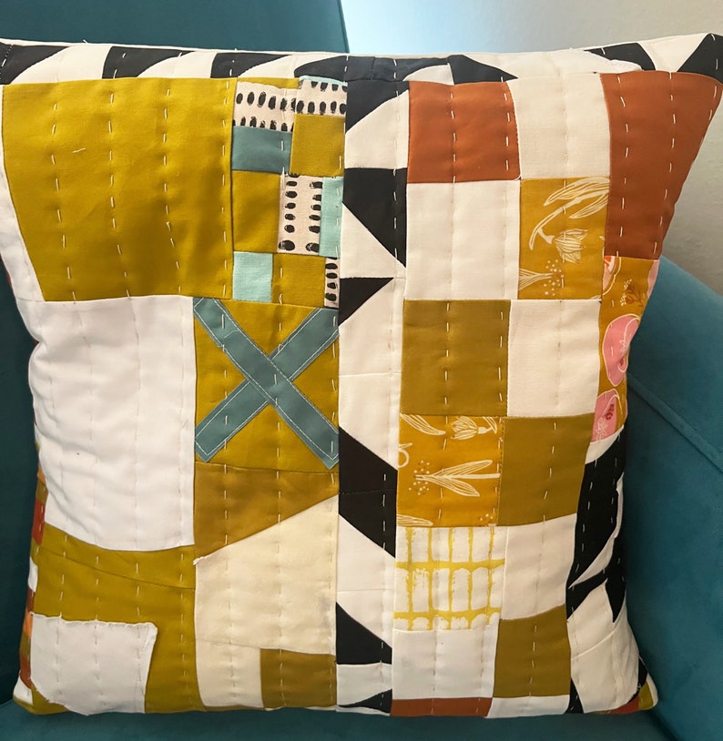 X Marks The Spot hand-quilted pillow. Abstract. Geometric. Gold and White with pops of color. Perfect for any decor. 16x 16 image 3