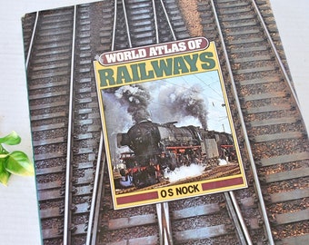 Edición vintage de 1979 'World Atlas of Railways' Libro de tapa dura, libro informativo ilustrado sobre historia ferroviaria y sistemas ferroviarios, O.S. Nock