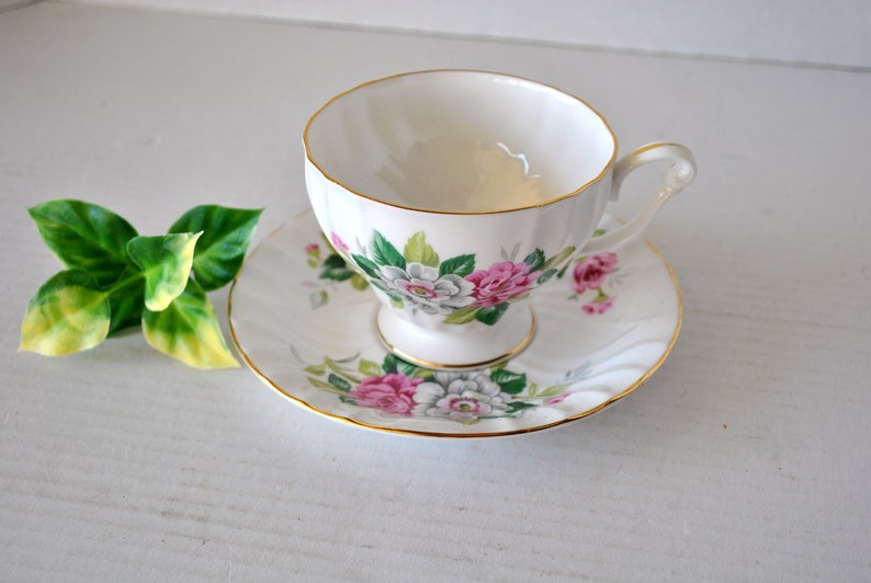MINI PORCELAIN FOOTED GOLD TAN /& BLUE SWIRL VINTAGE TEACUP AND SAUCER SET