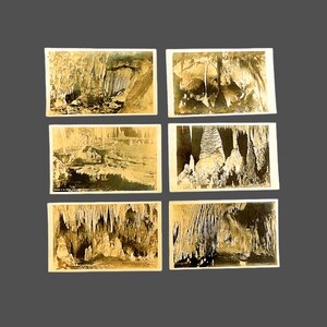 May include: Six vintage sepia-toned postcards featuring cave formations. The postcards depict stalactites and stalagmites in various cave settings. The images are detailed, showcasing the natural rock formations.