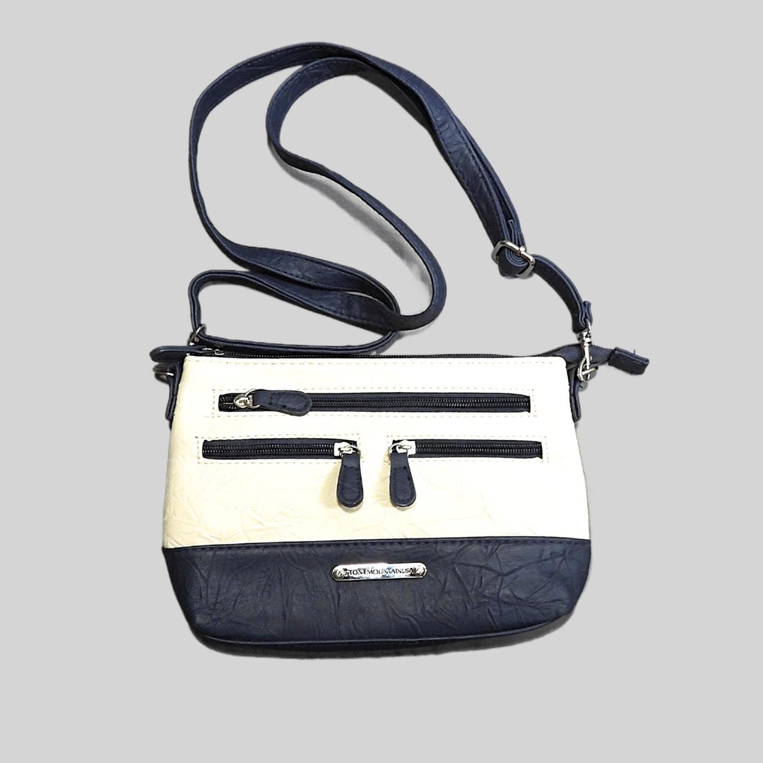 Stone Mountain Talia Bonded Leather Cross Body Bag in Navy & Bone