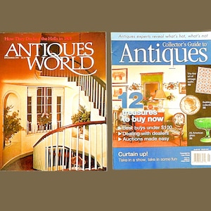May include: Two antique magazine covers, one titled "Antiques World" with a photo of a grand staircase, and the other titled "Collector's Guide to Antiques" with a photo of a room with antique furniture and a green glass bowl.
