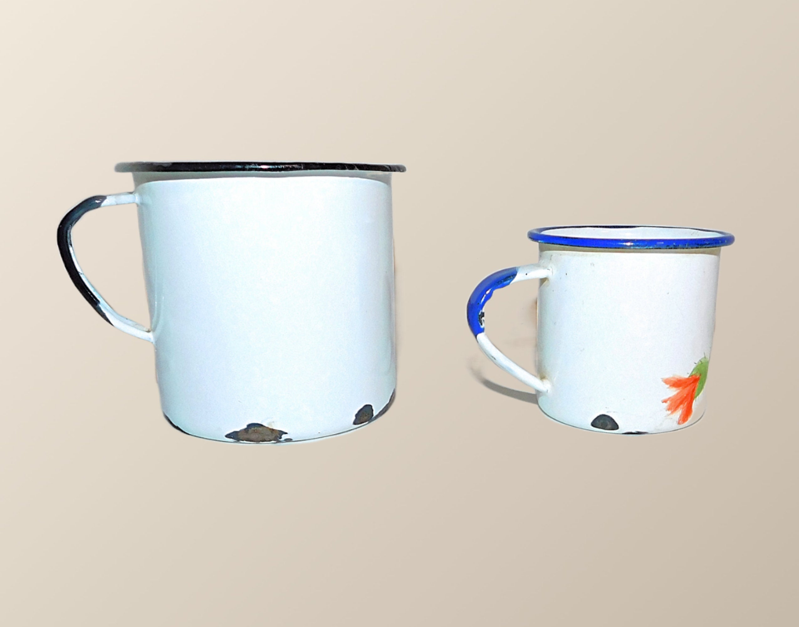 Two Vintage Enamelware Cups One White With Black Trim One White With