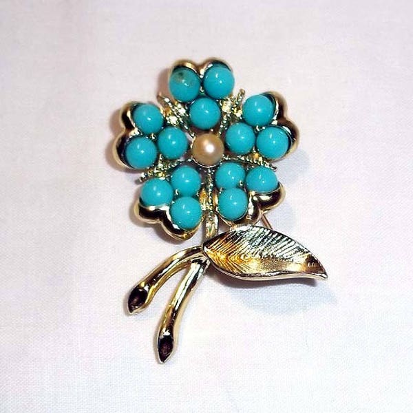 Vintage Sarah Coventry Gold Flower Brooch with Turquoise Colored Stones