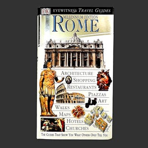 May include: A travel guide titled "Rome" from the Eyewitness Travel Guides series. The cover features illustrations of Roman architecture, a statue, and the text "Architecture, Shopping, Restaurants, Piazzas, Art, Walks, Maps, Hotels, Churches."
