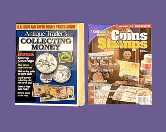 May include: Two vintage magazines on a purple background. The magazine on the left is titled "Antique Trader's Collecting Money" with images of coins and paper money. The magazine on the right is titled "Coins & Stamps".