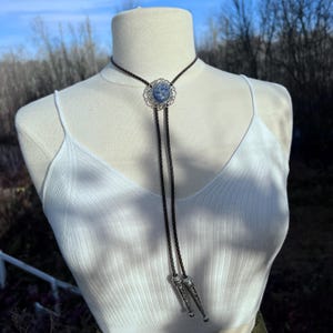Sodalite Bolo Tie Necklace on Ornate Bronze Setting on Classic Black Braided Leather Cord