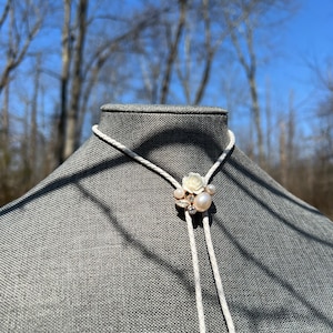Bolo Tie Necklace Western Wedding Formal Jewelry White Braided Leather Cord with Large Flower and Faux Pearl and Gem Design Unisex