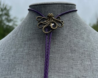 Funky Octopus Bolo Tie Necklace on Purple Braided Leather Bronze Color and Electroplated Tips