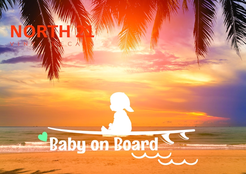 May include: White silhouette of a baby sitting on a surfboard with the text "Baby on Board" and a green heart. The background is a sunset over a beach with palm trees.