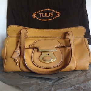 Bolso de mano Tods de piel, bolso de hombro para mujer, con funda protectora, con candado y llave, fabricado en Italia