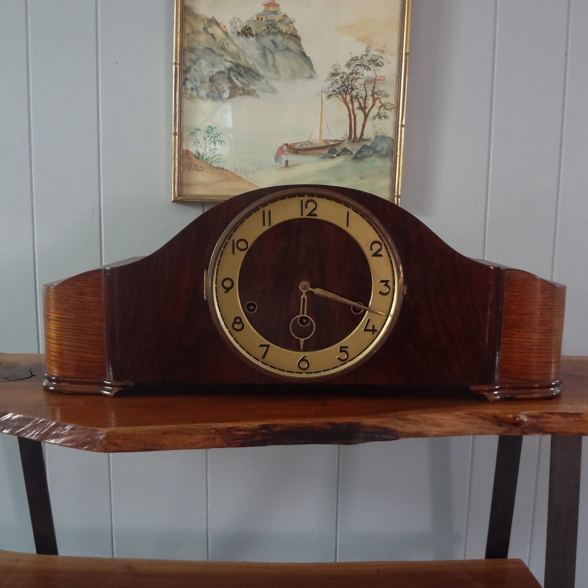 A small English brass skeleton clock with balance wheel, circa