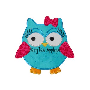 May include: A blue owl with pink accents and a pink bow. The owl has large eyes and eyelashes. The owl is a digital embroidery design.